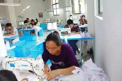 好消息!義烏襯衣來料加工項目落地汶川,近30萬襯衣生產設備已就位!